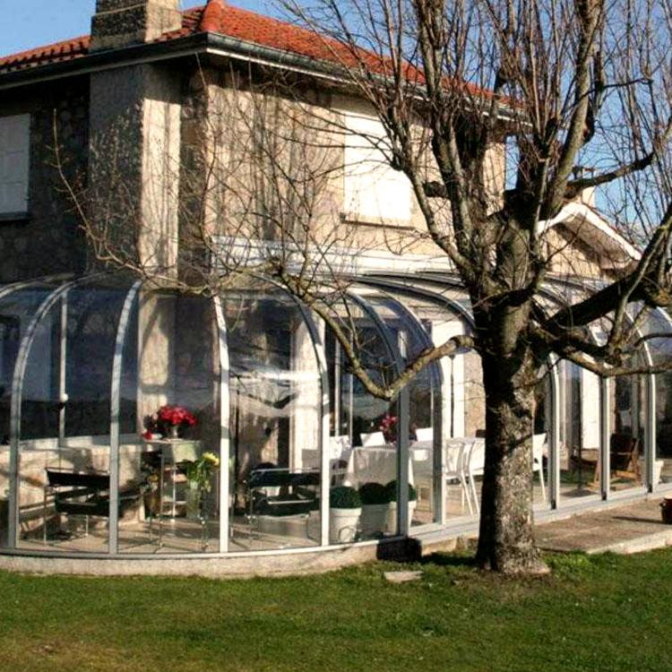 Abri de terrasse solar véranda avec rotonde en extrémité et sur muret
										